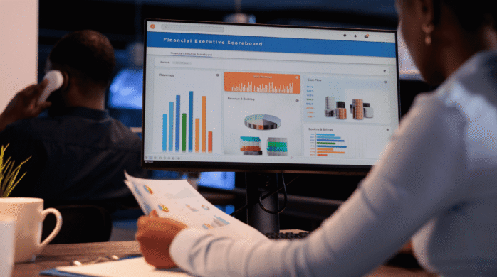 office-employee-analyzing-business-charts-computer-documents-looking-online-research-data-create-presentation-working-with-information-report-statistics-1